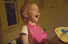 This adorable little girl finds the very concept of snow laughable