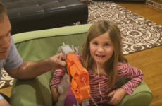 This daring little girl used a Nerf gun to pull out her loose tooth