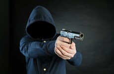 "Let go of the gun, you tramp": Woman tackled gunman who shot her partner