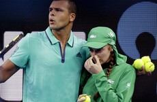 French tennis star stopped his Australian Open match to help an injured ball girl