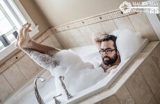 This beardy man posed for a sexy 'boudoir' photoshoot, and it's brilliant