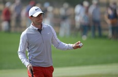 Late birdies boost Rory McIlroy in Abu Dhabi