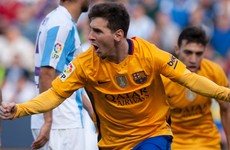 Messi grabs winner against Malaga to send Barcelona top