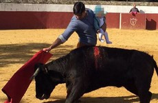 Spanish matador under fire for posting photo of himself bullfighting while carrying his baby
