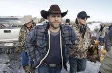 One killed, seven arrested as police clash with Oregon militia