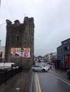 People aren't happy about this Michael Lowry banner erected on a 15th Century landmark