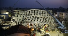 Photos: Race to free 120 people still buried under rubble