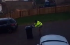 This guy's attempt at putting out the wheelie bin is the epic struggle of our time