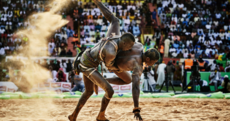 Ebola survivors play football, skiing crash and wrestling: The best sports photos of 2015