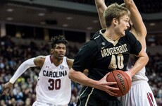 From downtown... college player sinks 80-foot buzzer-beater
