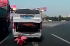 Video shows toddler falling out of van onto busy road