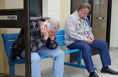 This Instagram account is collecting pictures of men looking miserable out shopping