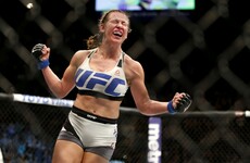 Miesha Tate chokes out Holly Holm to win the UFC women's bantamweight title