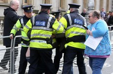 Photos: Protesters chant outside Leinster House as TDs make their way into new Dáil