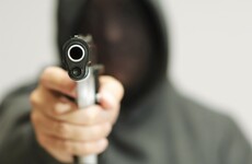 Two men arrested after supermarket staff threatened in armed robbery