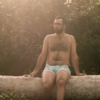 This body positive underwear ad features regular men in all their dadbod glory