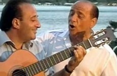 Eurozone crisis forces Berlusconi to put love song album on hold