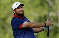 Shane Lowry rediscovers his best form to stay on the tail of early leader Spieth