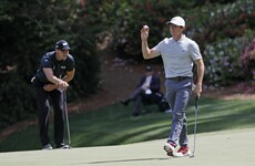 McIlroy's monster putt from 39 feet puts him back in contention as Spieth's lead disintegrates
