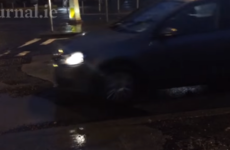 WATCH: Cars drive into huge pothole in Dublin city