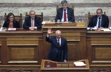 Greek prime minister survives confidence vote