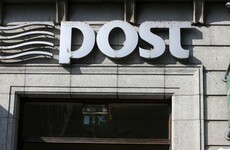 Armed robbers wrestle with An Post employee before fleeing with cash