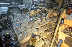Miracle as toddler is pulled from the wreckage of a collapsed building after four days