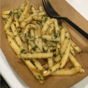 McDonald's is trialling garlic fries now and they look absolutely delish