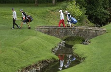 Some fan threw a golf ball and an earplug at McIlroy and Fowler last night