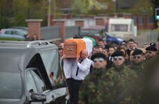 Police begin searches after arrests at paramilitary-style funeral