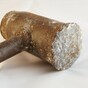 Men armed with gun and sledgehammer steal large amount of cash from shop