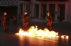 Greek protesters clash with riot police over further austerity reforms