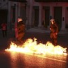 Greek protesters clash with riot police over further austerity reforms