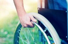 Woman told man in wheelchair she'd tie his laces - then punched and robbed him