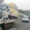A man was fined for speeding with three trucks stacked on top of each other