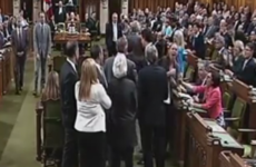Canadian prime minister apologises for elbowing opposition MP