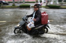 In pictures: More Bangkok residents urged to leave city as flooding worsens