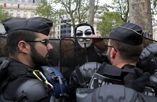 Four charged with attempted murder after police car torched in France