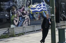 Greece passes spending cuts and tax hikes in order to unlock billions in bailout funds