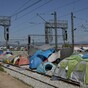 Greek police evacuating refugee camp containing over 8,000 people
