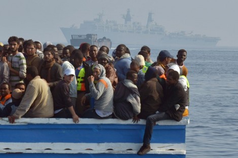 File photo of stranded migrant boat off the Libyan coast. 