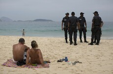 Gunmen run wild in Rio tourist spots ahead of Olympics