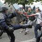Violent protests in Paris see police fire tear gas just two weeks ahead of Euro 2016