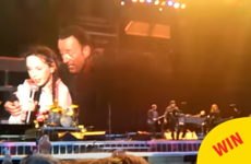 A young girl got to sing and take a selfie on stage with Springsteen in Croker last night