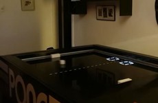 This Pong table is trying to bring the classic arcade game into the real world