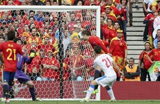 Late Gerard Pique header gets Spain out of jail
