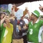 These Irish fans were having serious craic behind a Hungarian TV reporter after the match
