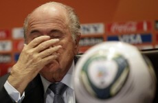 Blatter says sorry for racism comments, refuses to resign