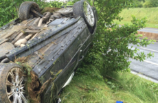 Driver survives serious crash after losing control in heavy rain