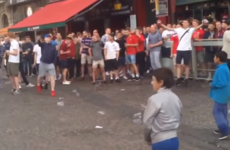 Videos show English fans throwing coins and jeering at migrant children